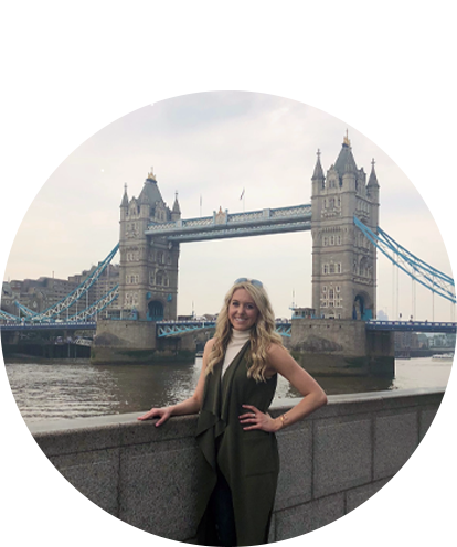 Anastasia Gillen fun photo posing with the Thames river and London Bridge in the background.