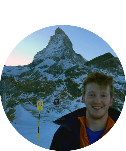 Tim O'Neill in ski jacket with the Matterhorn in background.