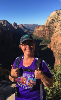 melinda white hiking in a mountainous setting