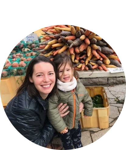 Dina Benzil fun photo posing with child.