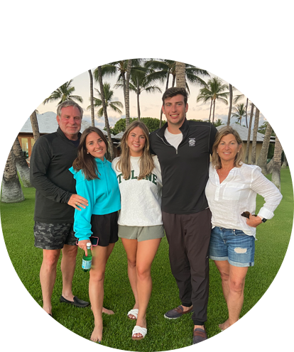 Jack Rosenthal posing with parents and sister in Kukio Beach Hawaii.