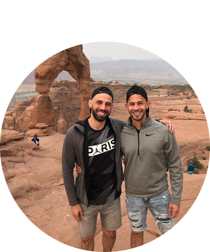 Michael Fernandez fun photo posing with a male in the desert.