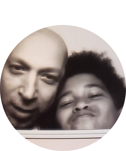 Payam Abdali photobooth picture with young child.