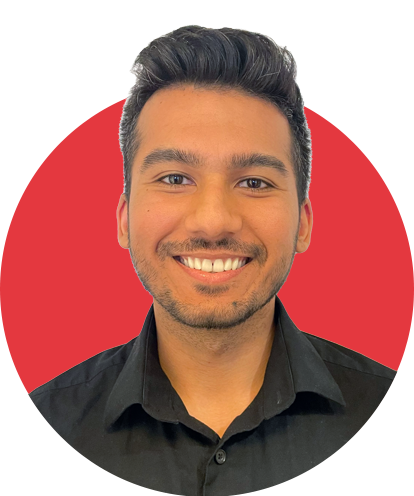 Victor Patel headshot with red background.
