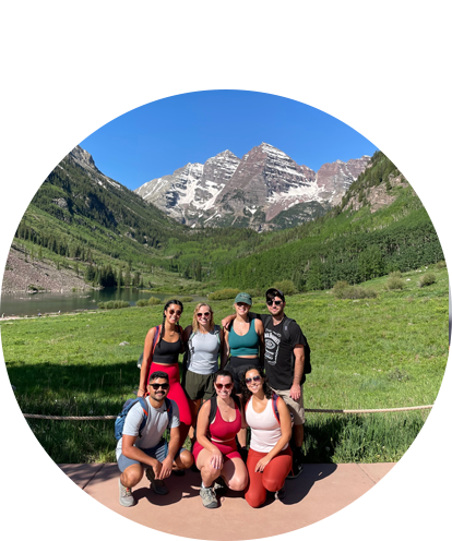 Huyana Pour fun photo (group of seven adults with mountain lake and mountains in background).