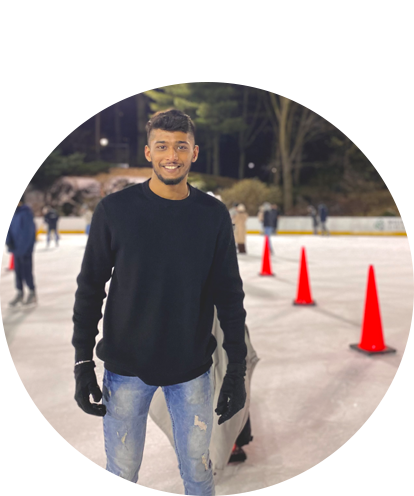 Parth Dharia fun photo (adult male ice skating at night with safety cones in background).