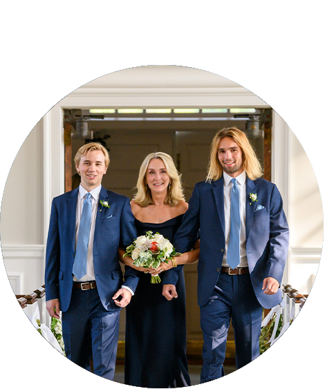 two men and women walking down aisle